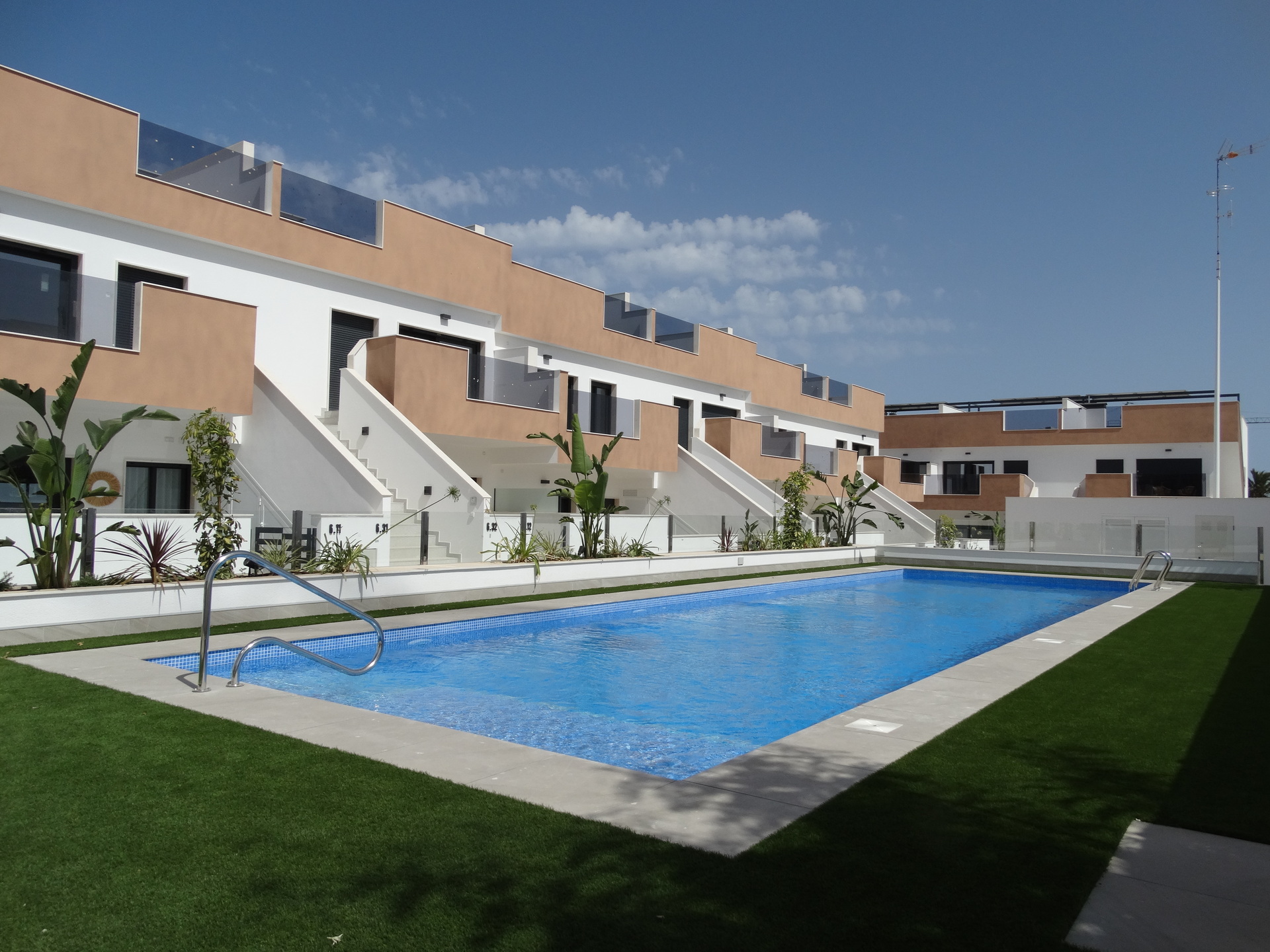Located in the charming town of Pilar de la Horadada, this residential complex offers a selection of - Image 1