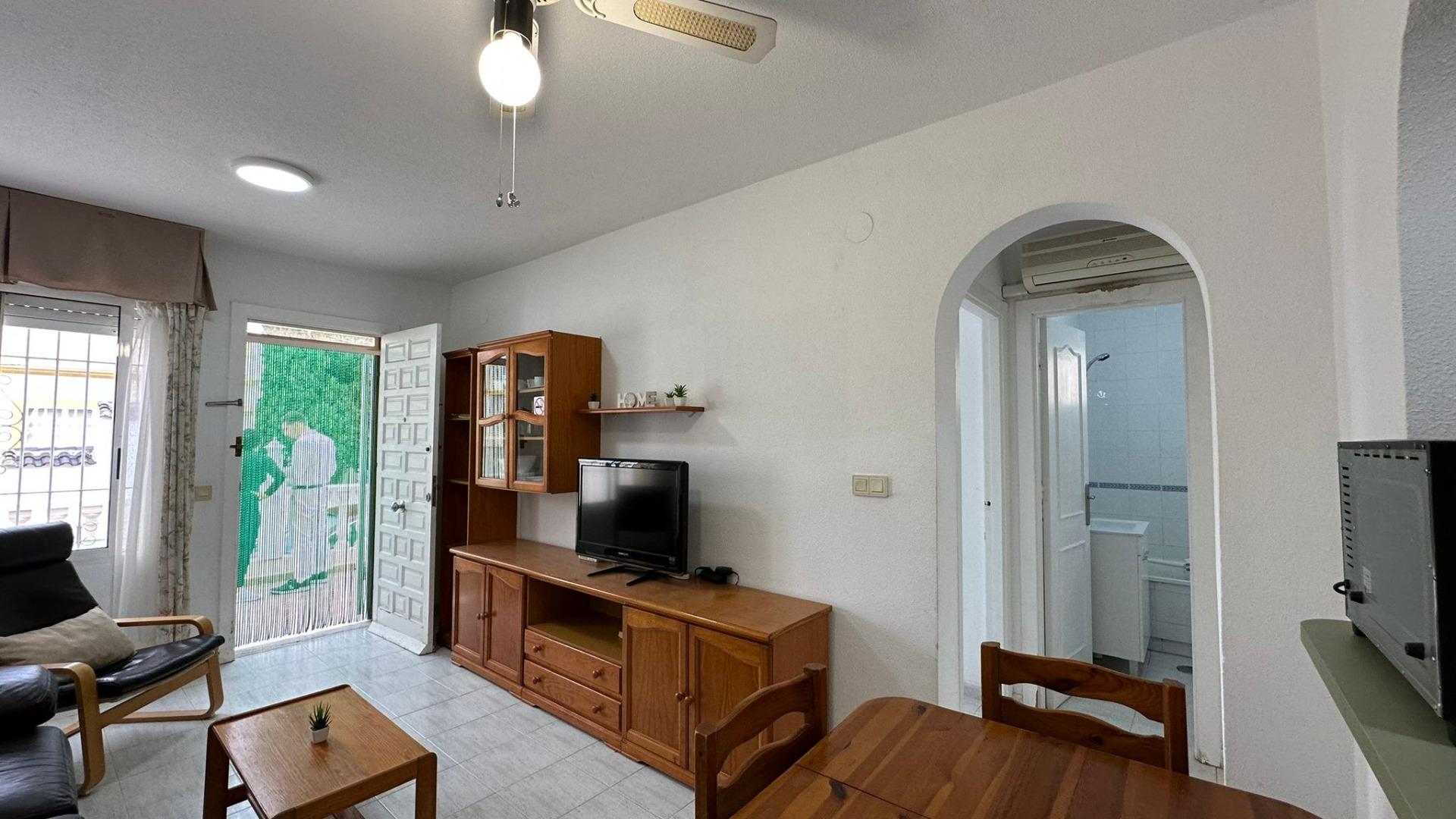 This low-rise bungalow emerges as a haven of serenity and warmth amidst the vibrant coastal landscap