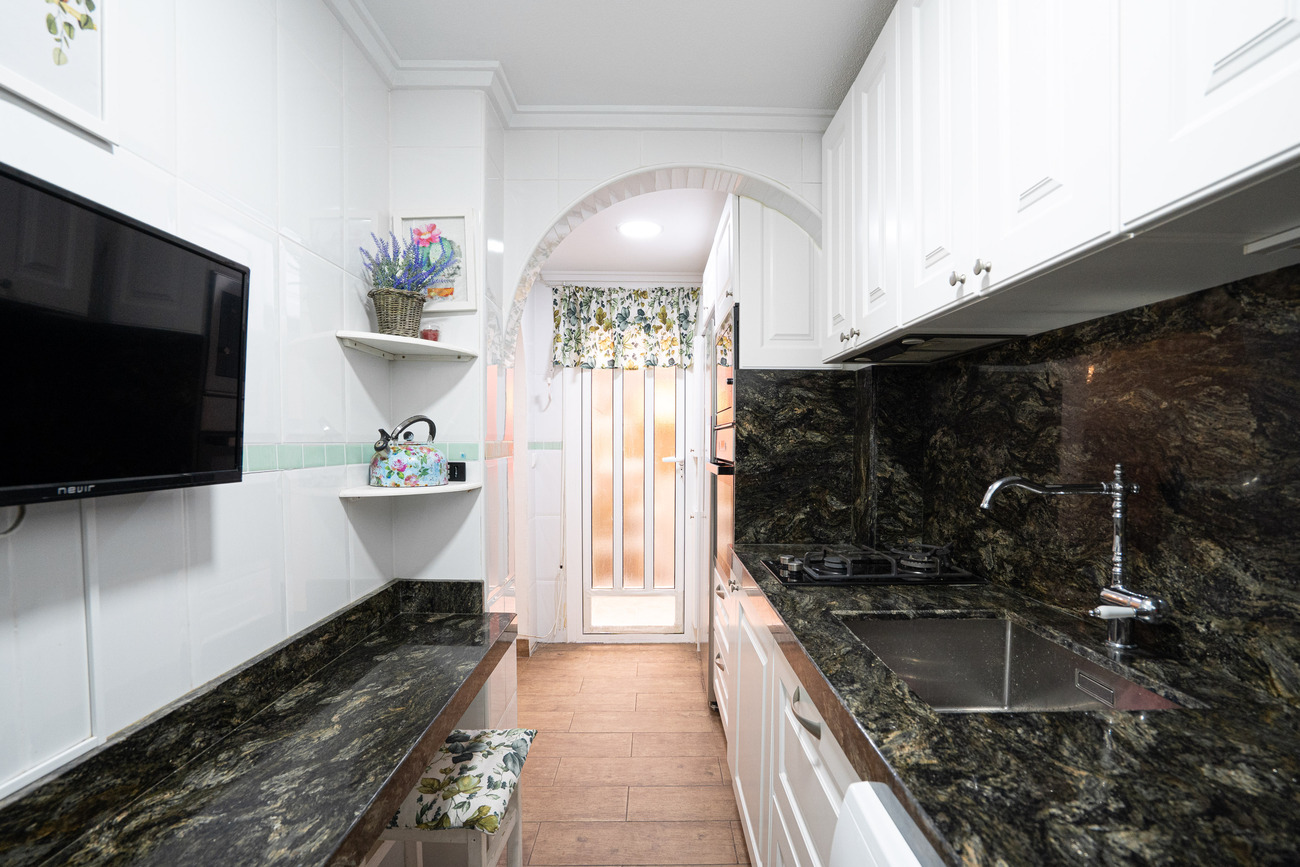 This charming and well-designed townhouse offers both style and functionality - Image 1