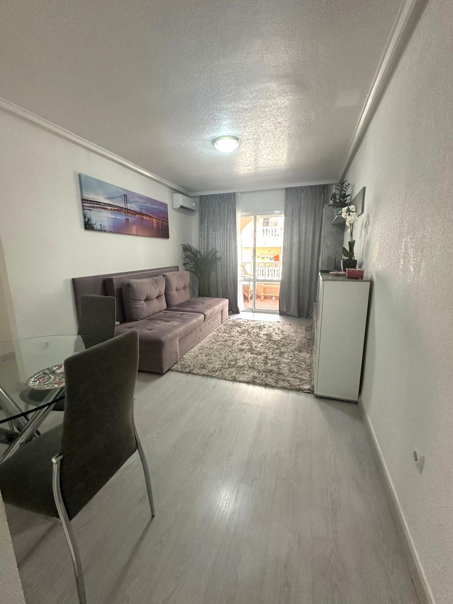 Modern 2 bedroom flat with private terrace, pool and garden in Torrevieja Upon entering this modern - Image 1