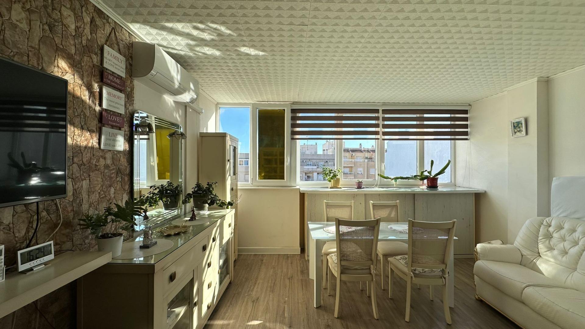 In the heart of Torrevieja, you'll find this welcoming one-bedroom, one-bathroom apartment, designed - Image 1