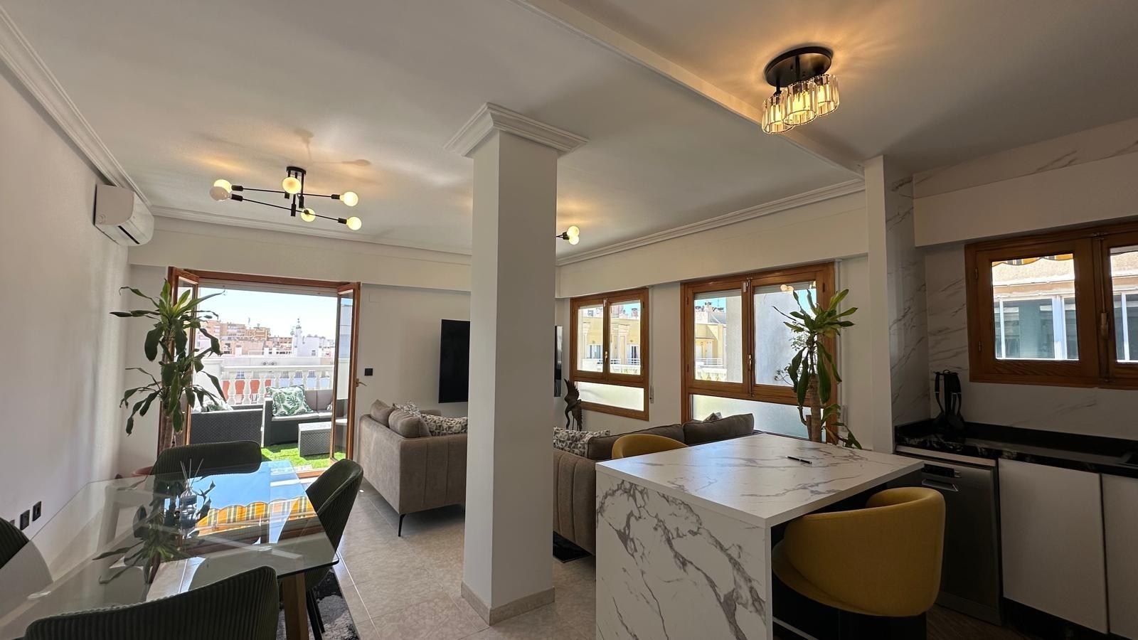 Discover this fantastic 2-bedroom, 1-bathroom apartment located on the well-known Avenida Habaneras - Image 1