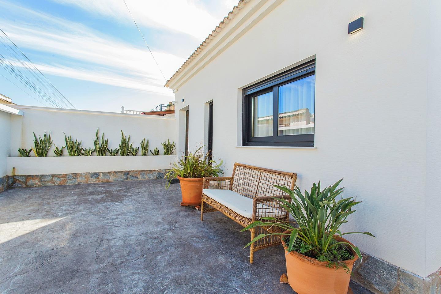Welcome to this beautifully renovated villa in the sought-after El Chaparral neighborhood of Torrevi - Image 1